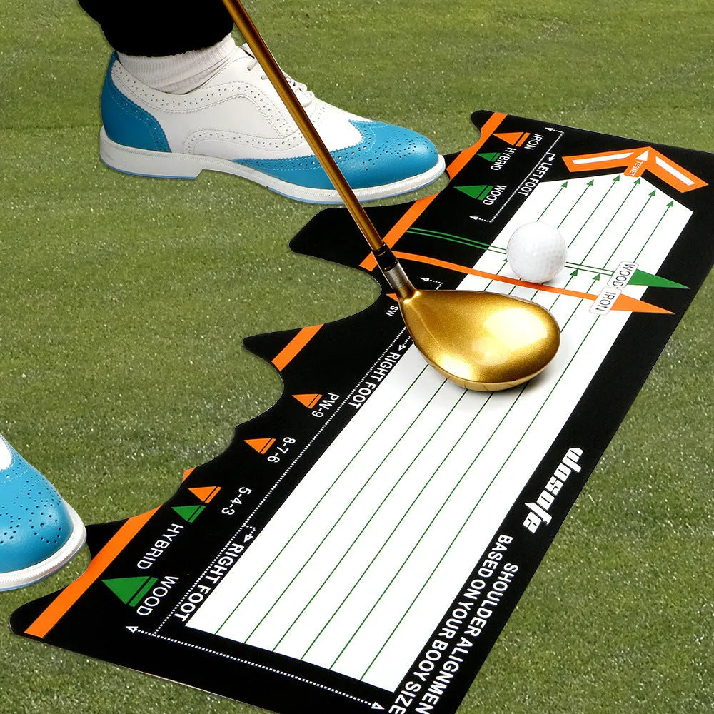 Black neoprene golf swing stance alignment pad on grass