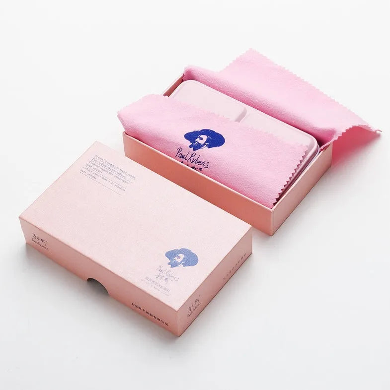 Pearl-effect solid watercolour paint pans in a set showing iridescent colours.