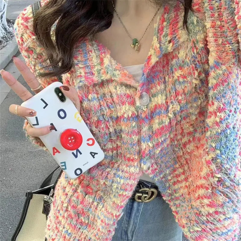 Rainbow pattern knitted cardigan in pink and green colours with toothbrush hair texture