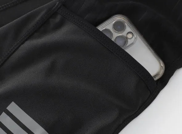 Black cycling shorts with three-inch inseam, cargo pockets, and removable shock-absorbing cushion