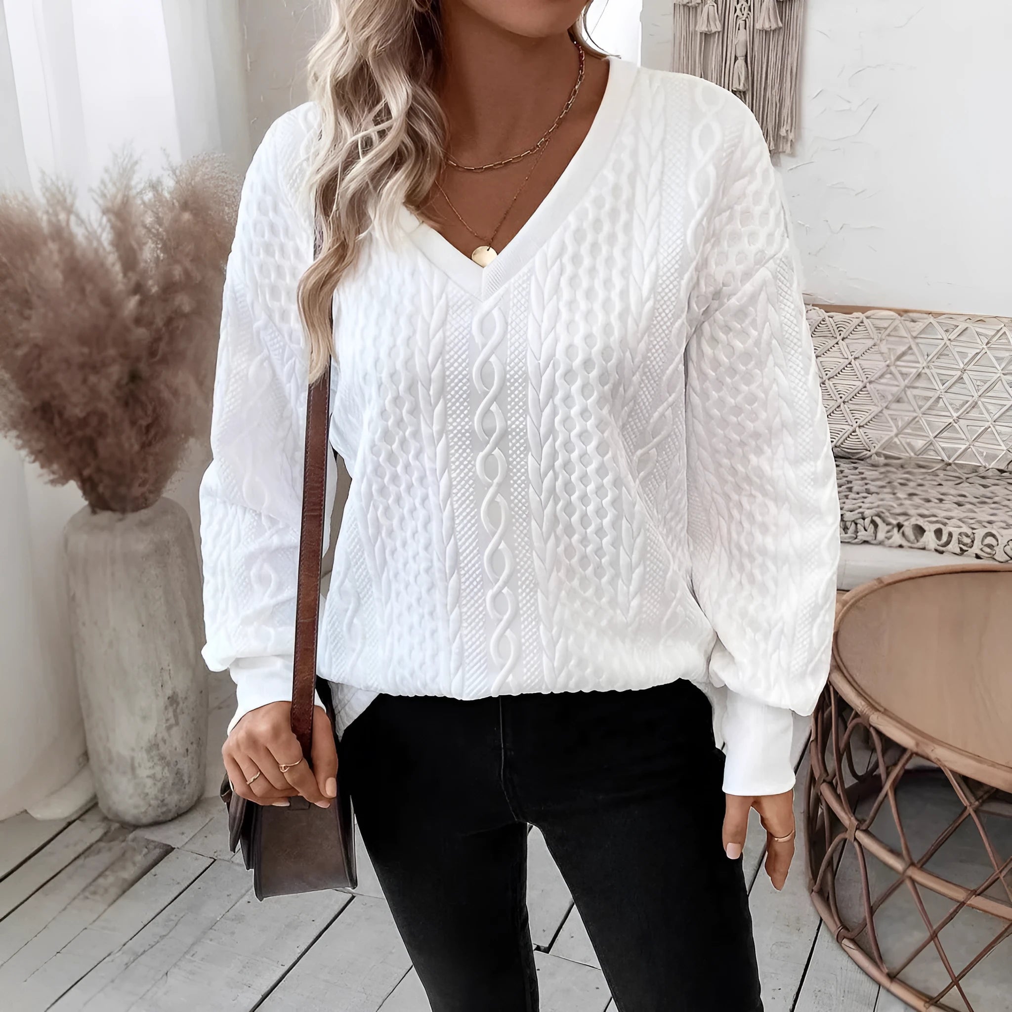 Milky white loose fit long sleeve T-shirt with a 3D pattern, casual pullover style.