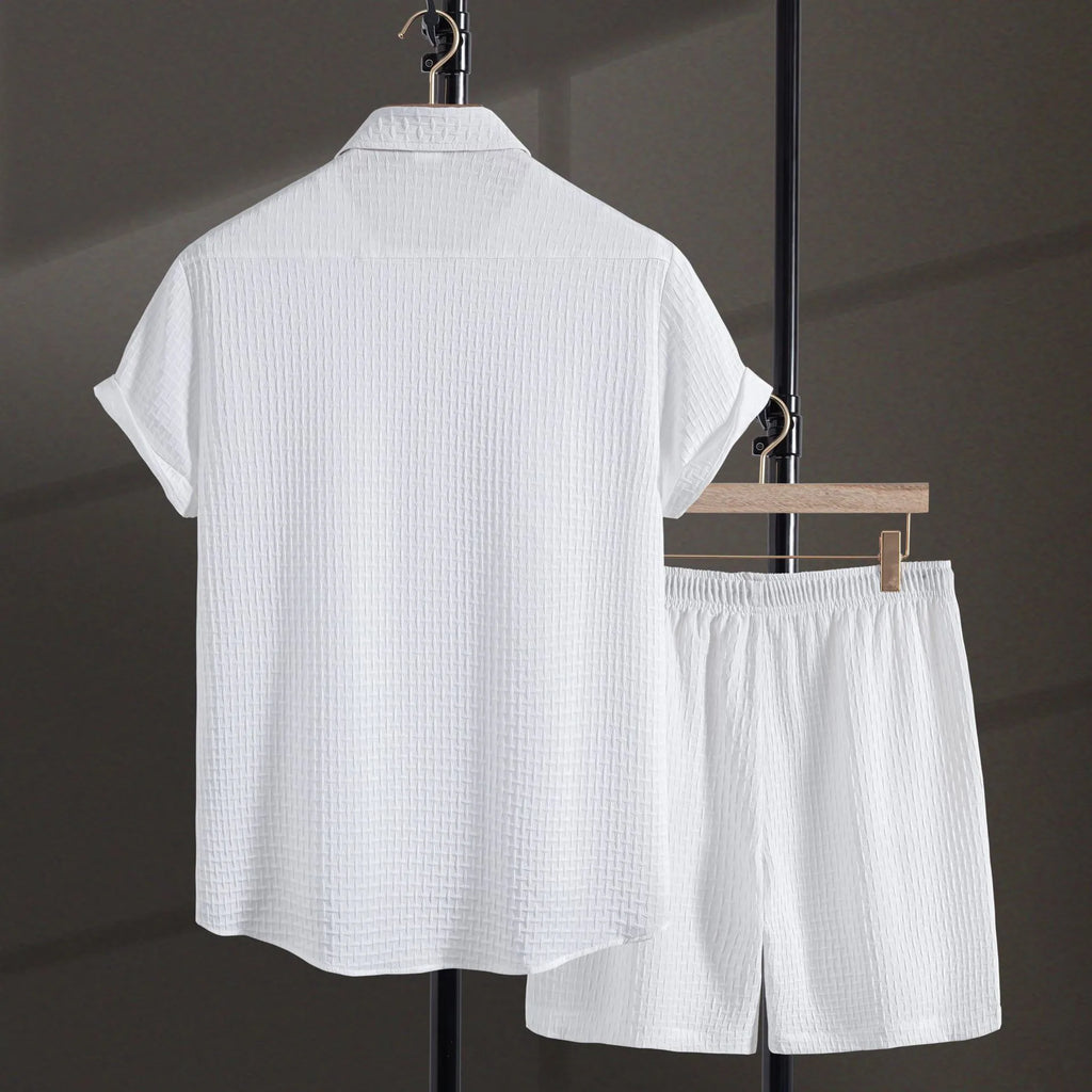 Men's black cotton blend short sleeve shirt and shorts suit set on a hanger.