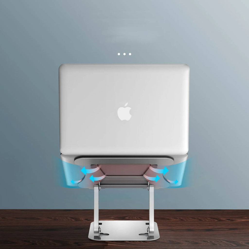 Silver aluminium alloy folding laptop cooling stand on a desk with a notebook placed on it