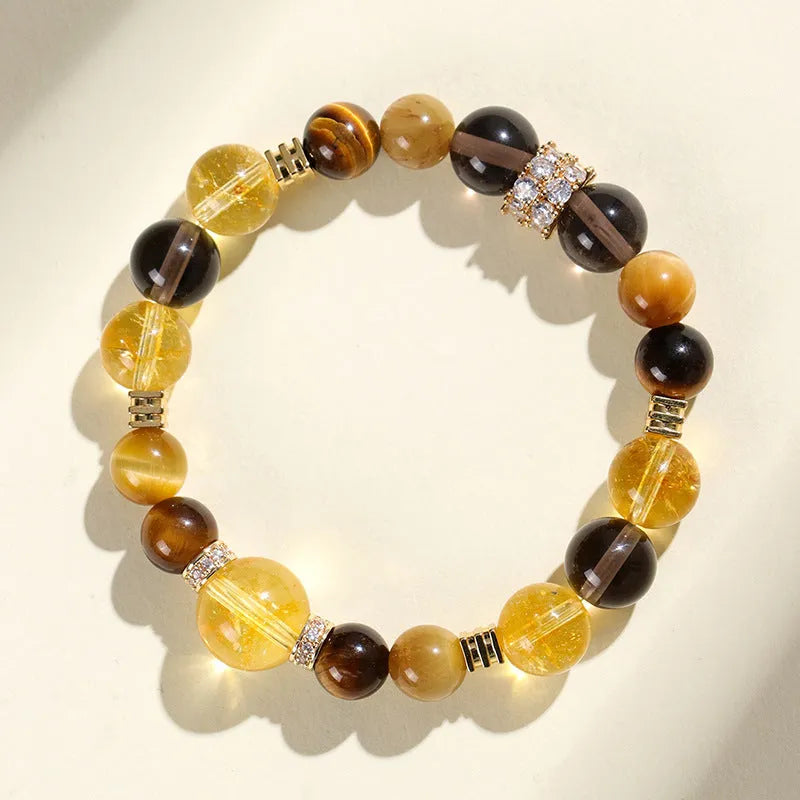 Handmade yellow crystal beaded bracelet with 10mm tower string beads on wrist