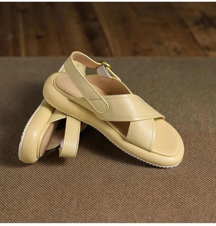 Women's flat non-slip cross Roman sandals in white with a microfiber upper and polyurethane sole