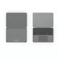 Grey wireless Bluetooth folding keyboard for mobile phones and tablets on a table.