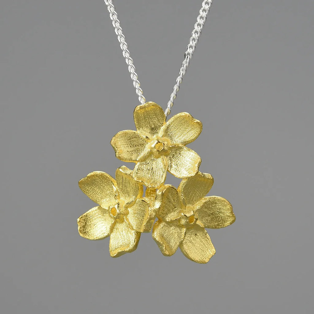 Silver Myosotis Sylvatica flower pendant in pastoral style with hand-designed open mouth shape