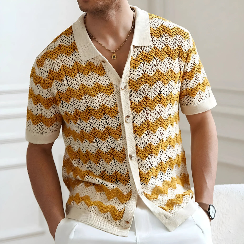 Men's blue short sleeve corrugated sweater with jacquard flocked texture on a hanger.