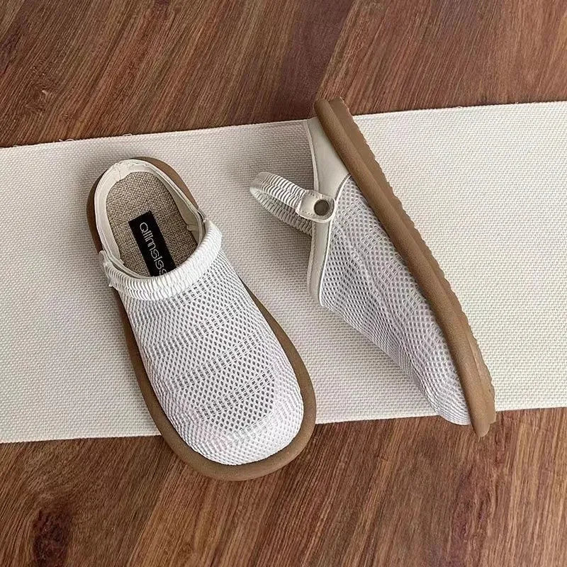 Linen slip-on hole shoes with mesh lining and rubber sole in milky white colour