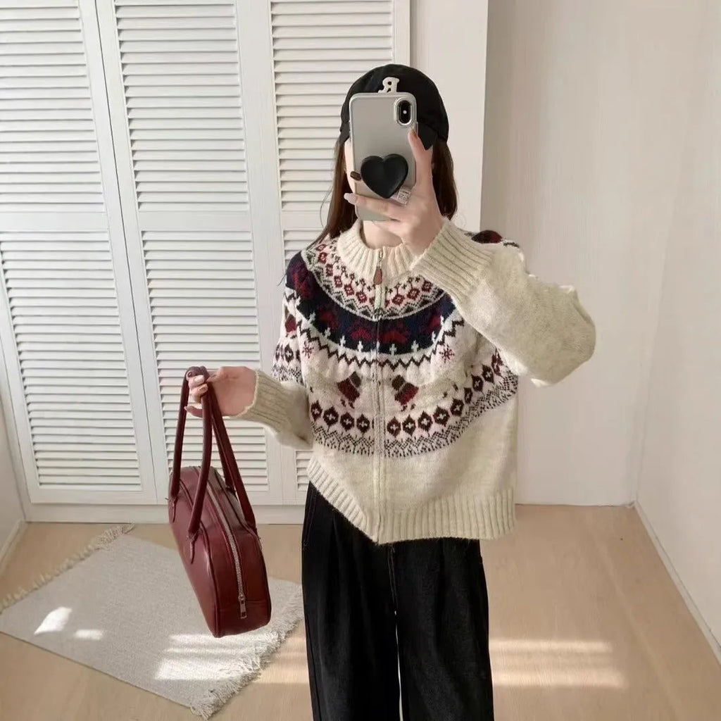 Ethnic style apricot coloured jacquard pullover sweater with 3D pattern and round neck.