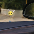 Swing Spring Bee soft fur ball car decoration with cartoon bee shape on adhesive backing.