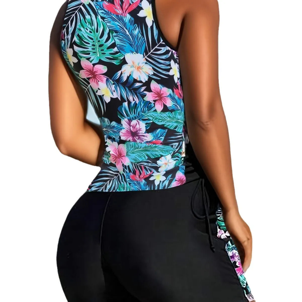 Women's plus size floral print high-waist swimsuit bikini in blue on a mannequin.