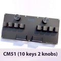 Magnetic axis gaming numeric keypad with colour screen, control knob, and RGB backlighting on a desk.