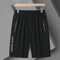 Men's black loose-fit nylon sports shorts on a hanger