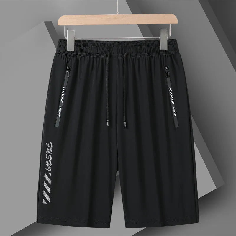Men's black loose-fit nylon sports shorts on a hanger