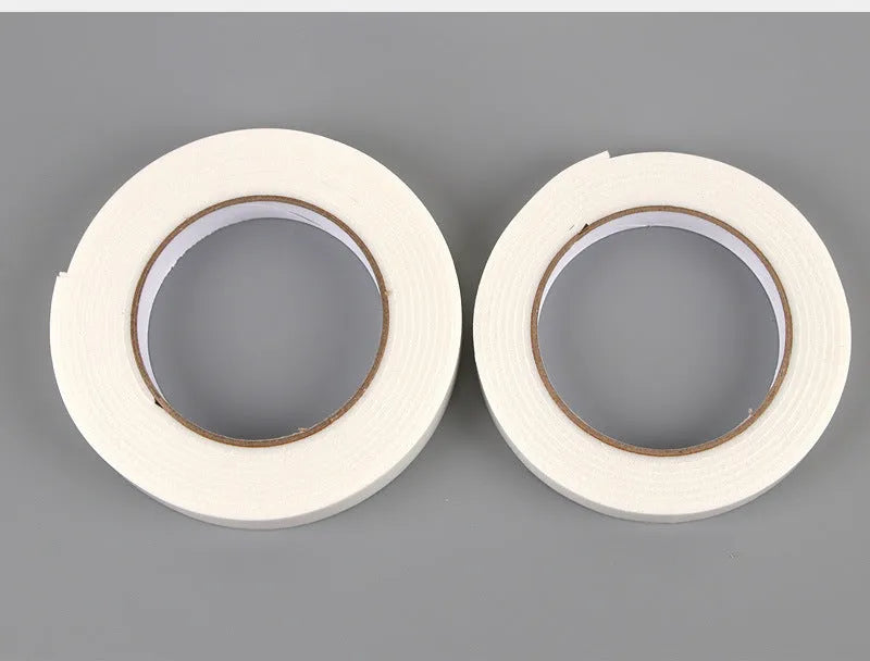 Foam double-sided adhesive tape roll showing 3mm thickness with measurements for 15mm, 18mm, and 30mm width options