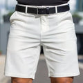 Men's apricot-coloured straight-leg polyester shorts with a fifth-pants length on a neutral background.