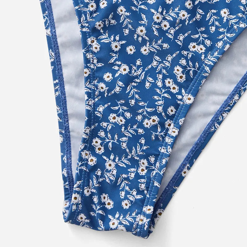 Blue ladies' swimsuit three-piece set without underwire, showing top and shorts.