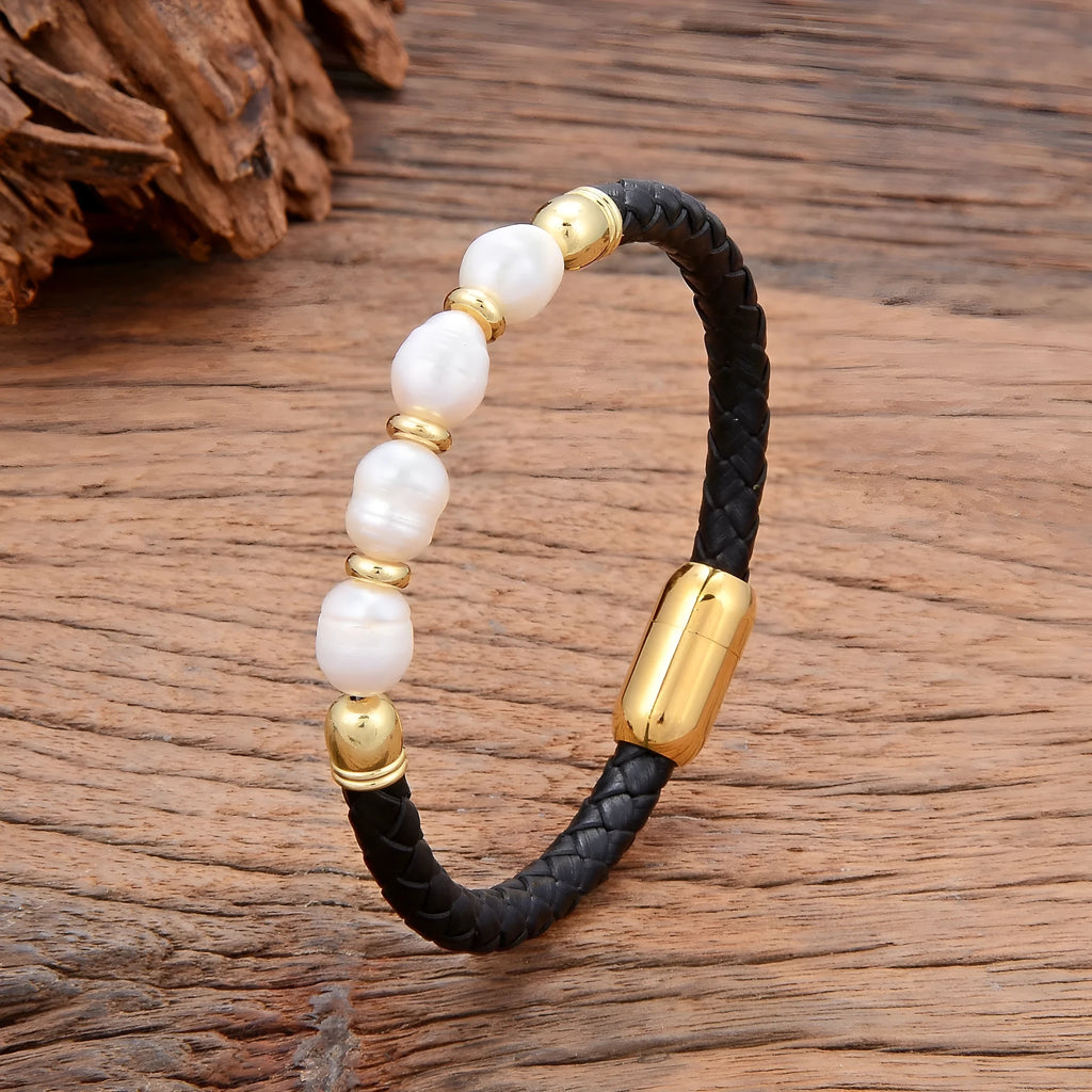 Handmade unisex bracelet with irregular pearls on adjustable leather strap in grey pearl and black.