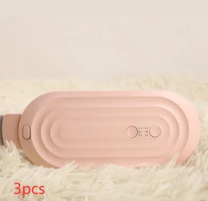 Pink electric menstrual heating pad with controller showing temperature display and vibration settings
