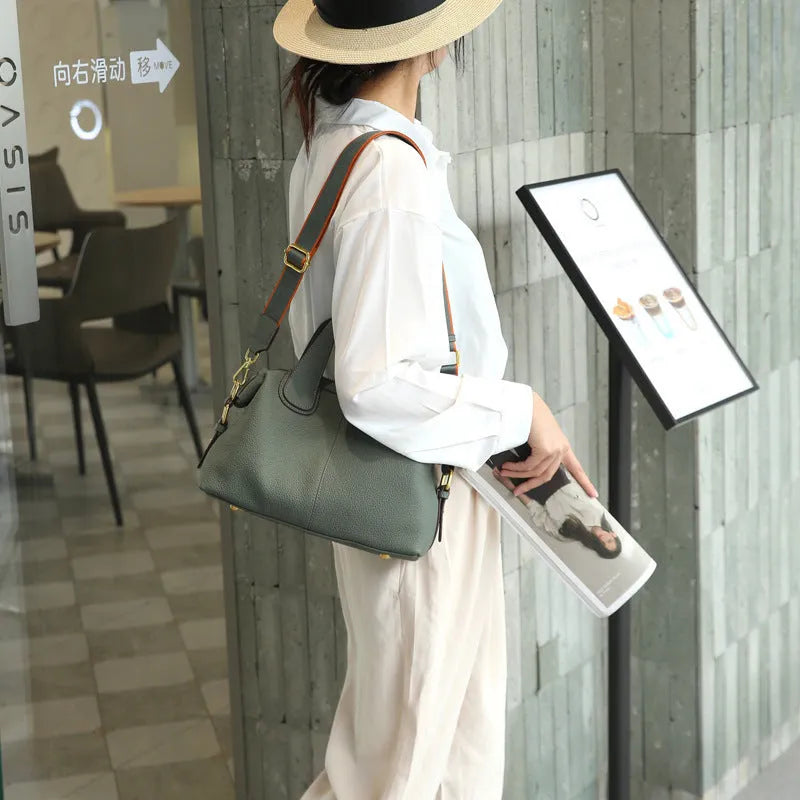Women's genuine leather cross-body bag in horizontal square shape with internal compartments