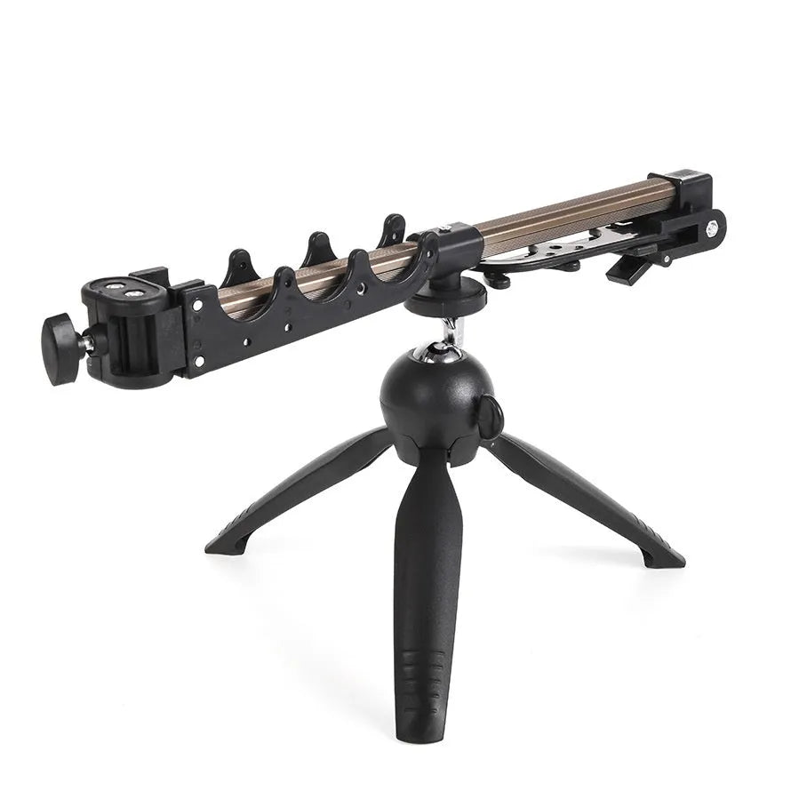 Silver aluminium tripod ice fishing rod holder bracket on ice.