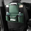 Genuine leather car seat back storage bag hanging from vehicle seat