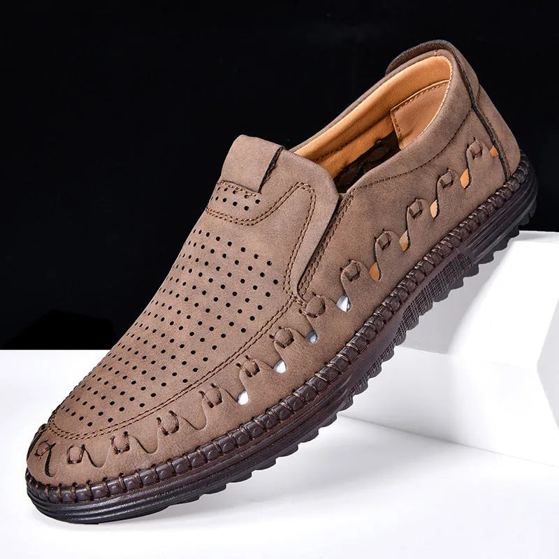 Men's brown slip-on casual leather shoes with a round toe and flat sole.