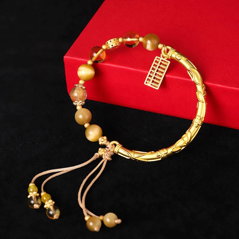 Women's abacus tag bracelet with tigereye and citrine gemstone beads and copper diamond charm
