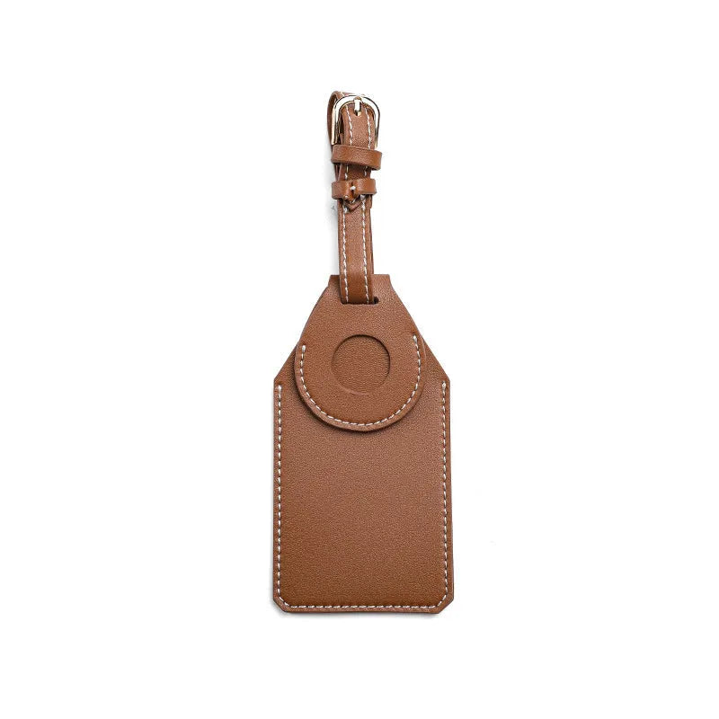 Black, brown, and orange PU/PVC protective cases for a luggage tag location tracker.