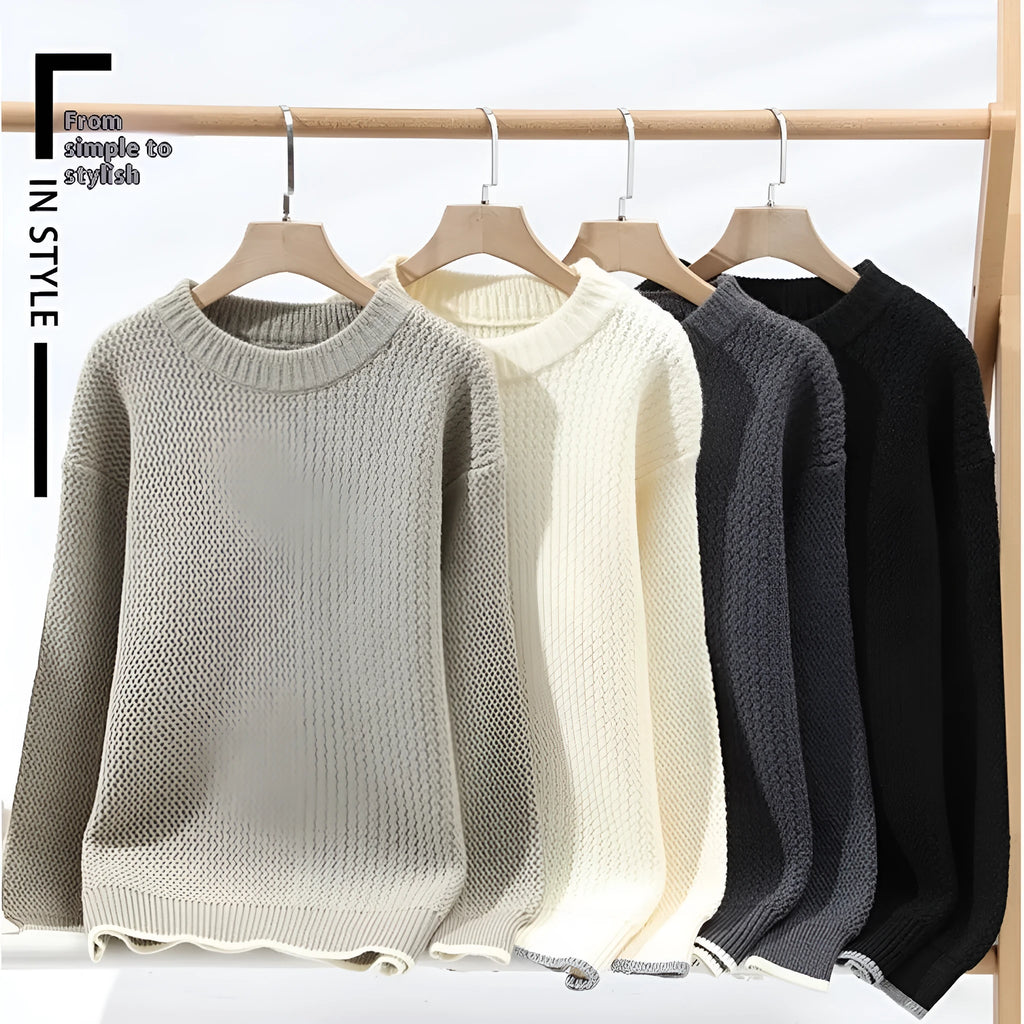 A grey men's loose-fit round neck long sleeve pullover sweater on a hanger.