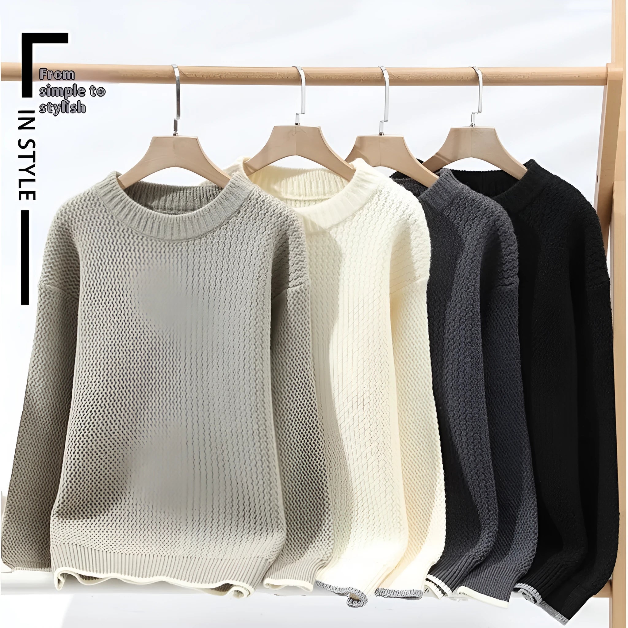A grey men's loose-fit round neck long sleeve pullover sweater on a hanger.