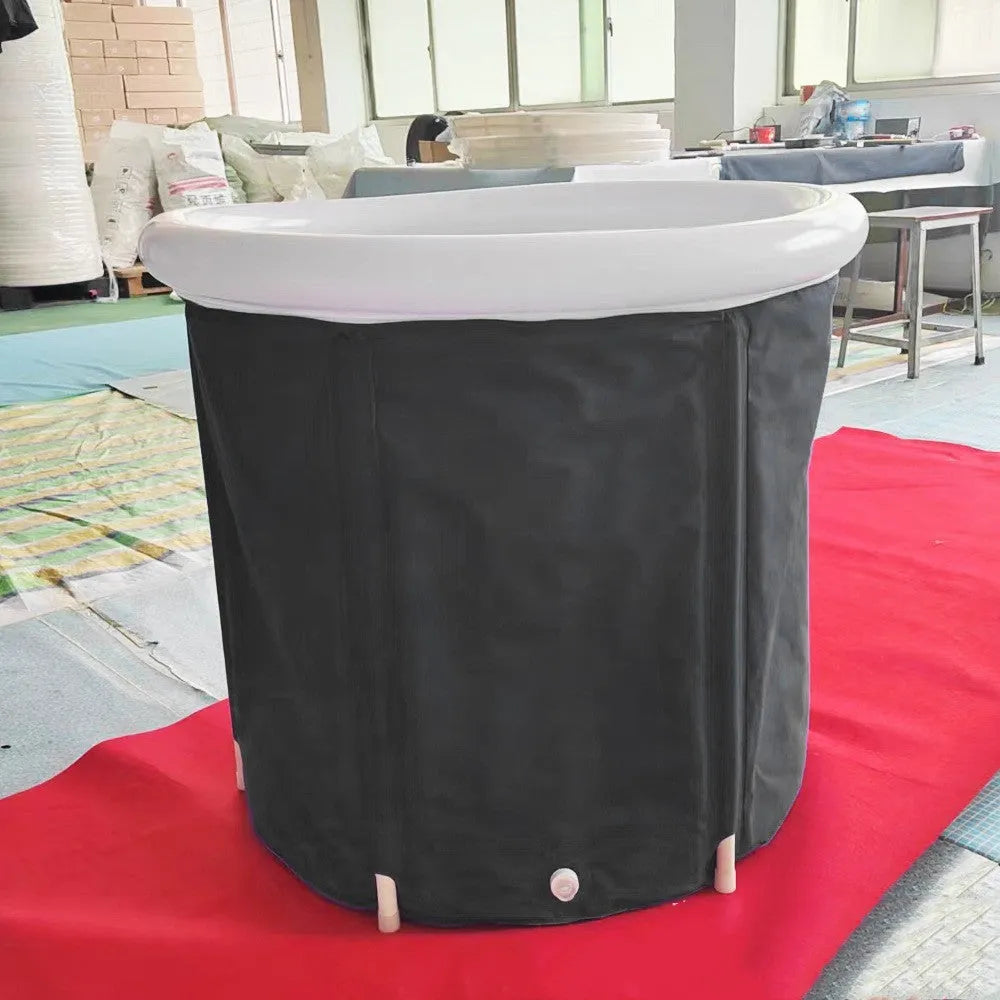 Black portable inflatable ice bath tub with weather lid for recovery therapy