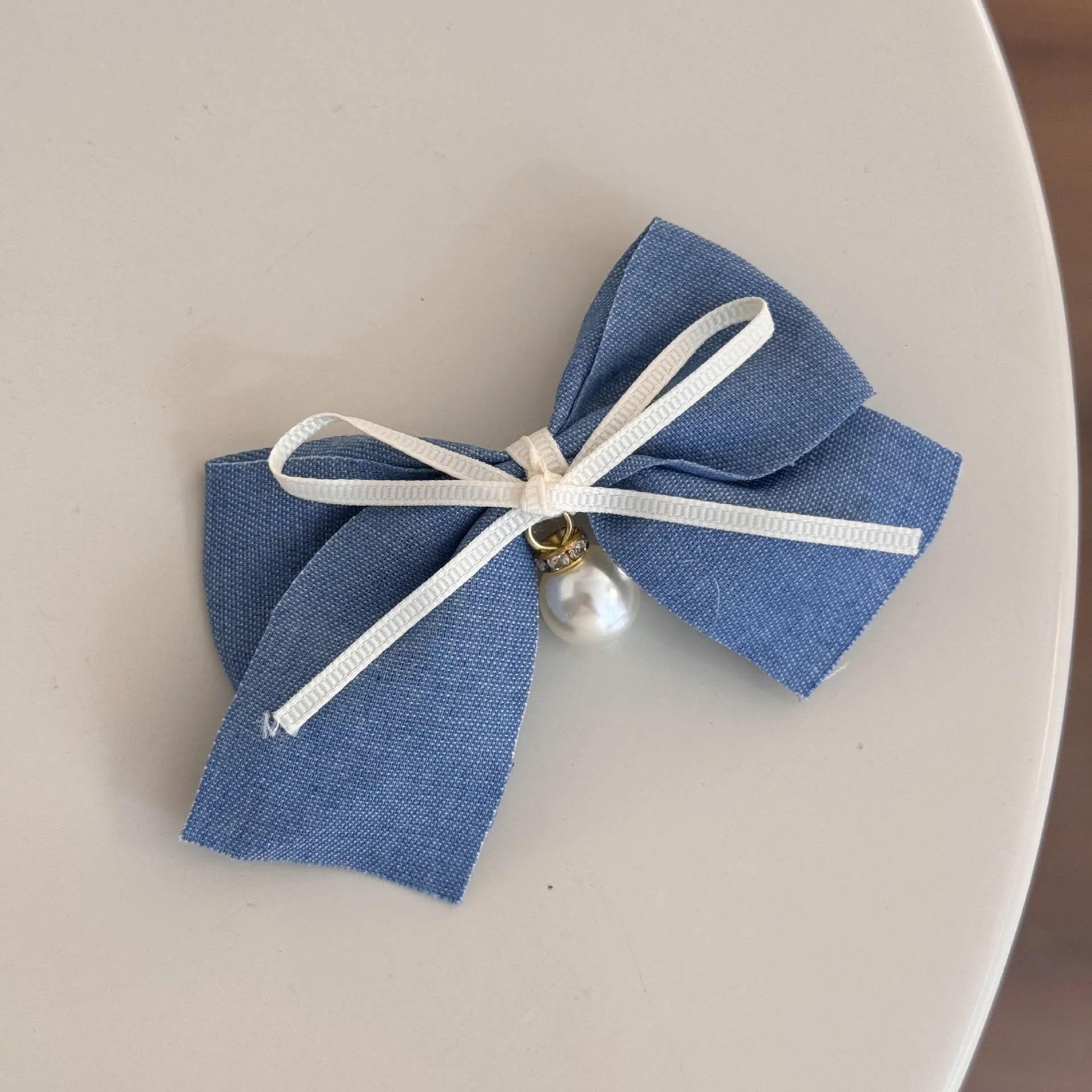Hand-made pastoral cloth barrettes with beige lace and blue bow designs for women's hair
