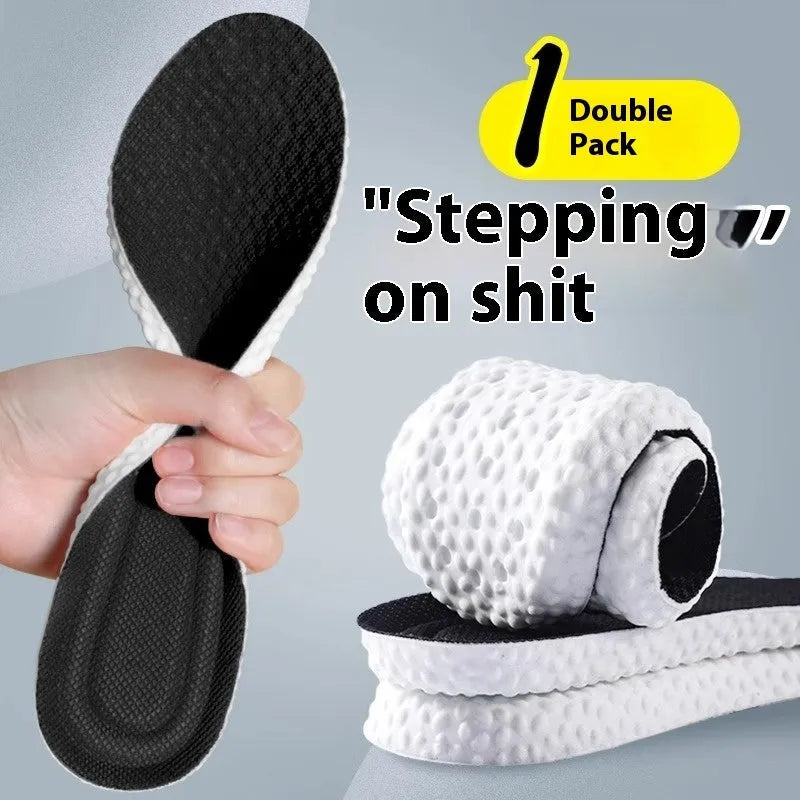 Pair of grey PU foam sports insoles on a white background, showing trimmable edges.