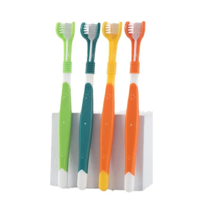 Pet toothbrush with angled head in assorted colours including orange, dark green and blue pink