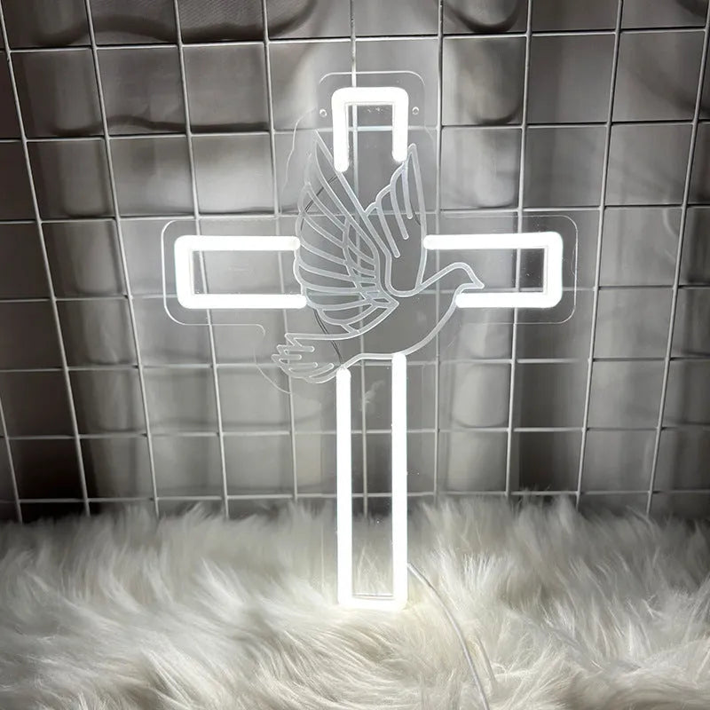 Acrylic LED neon light plate with peace dove cross design emitting white light on a dark background