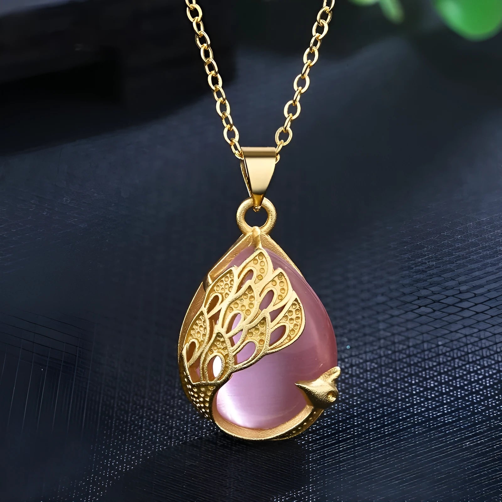 Green chalcedony imitation crystal peacock pendant on copper electroplated frame, single pendant style without chain, simple fu character design