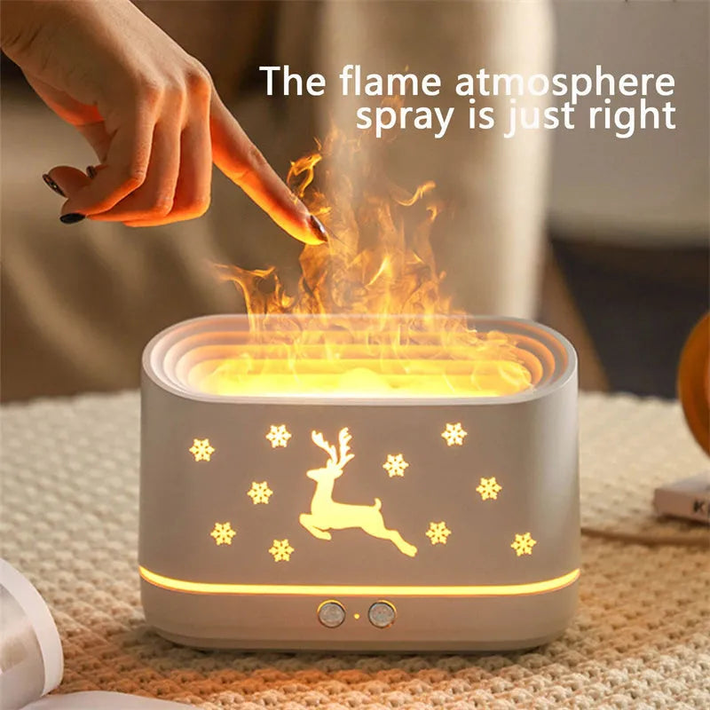 White flame effect humidifier diffuser with LED lighting and Christmas pattern, showing mist output