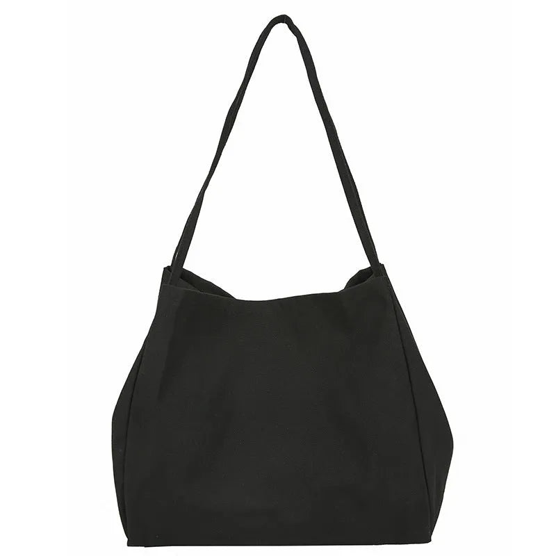 Solid colour women's canvas handbag with double shoulder straps and sandwich pocket design