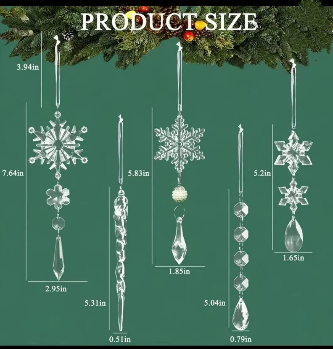 Ten clear transparent acrylic ice cone Christmas tree ornaments with white ribbons on green branches.