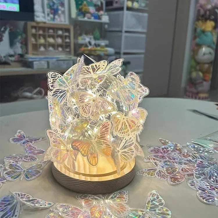 Handmade butterfly night lamp with glass shade and raw wood base measuring 12x15cm