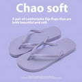 Orange foldable plastic beach slippers with non-slip patterned soles and hollow-out uppers.