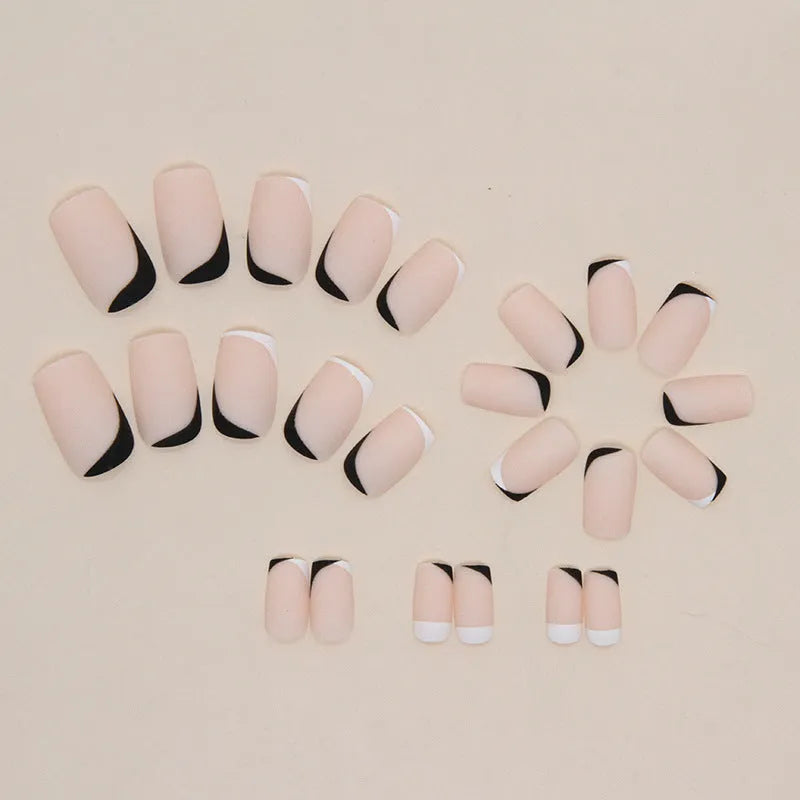 Black and white frosted artificial nails set with mandarin duck colour design