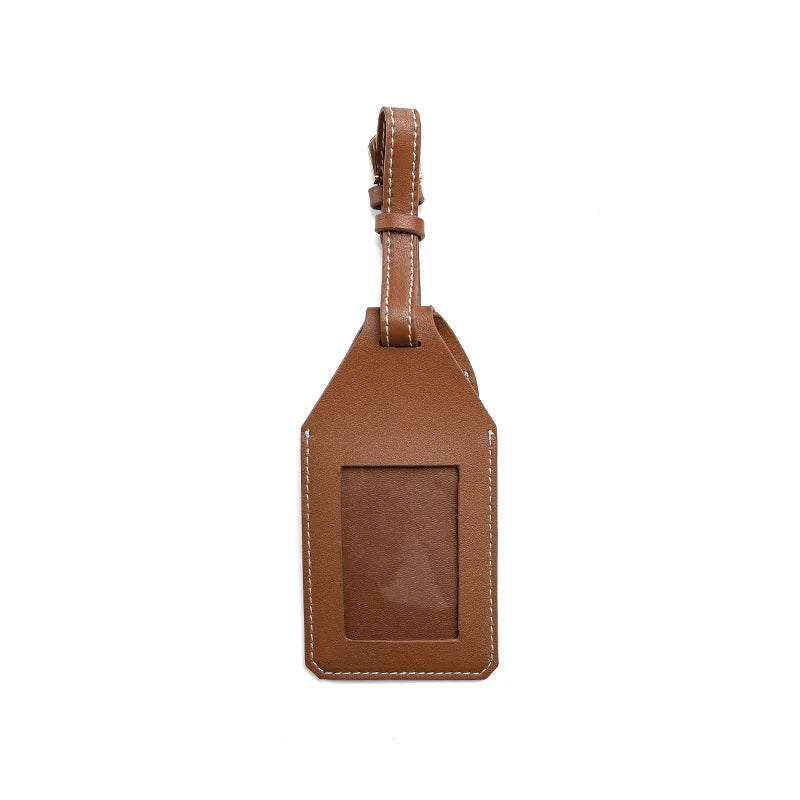 Black, brown, and orange PU/PVC protective cases for a luggage tag location tracker.