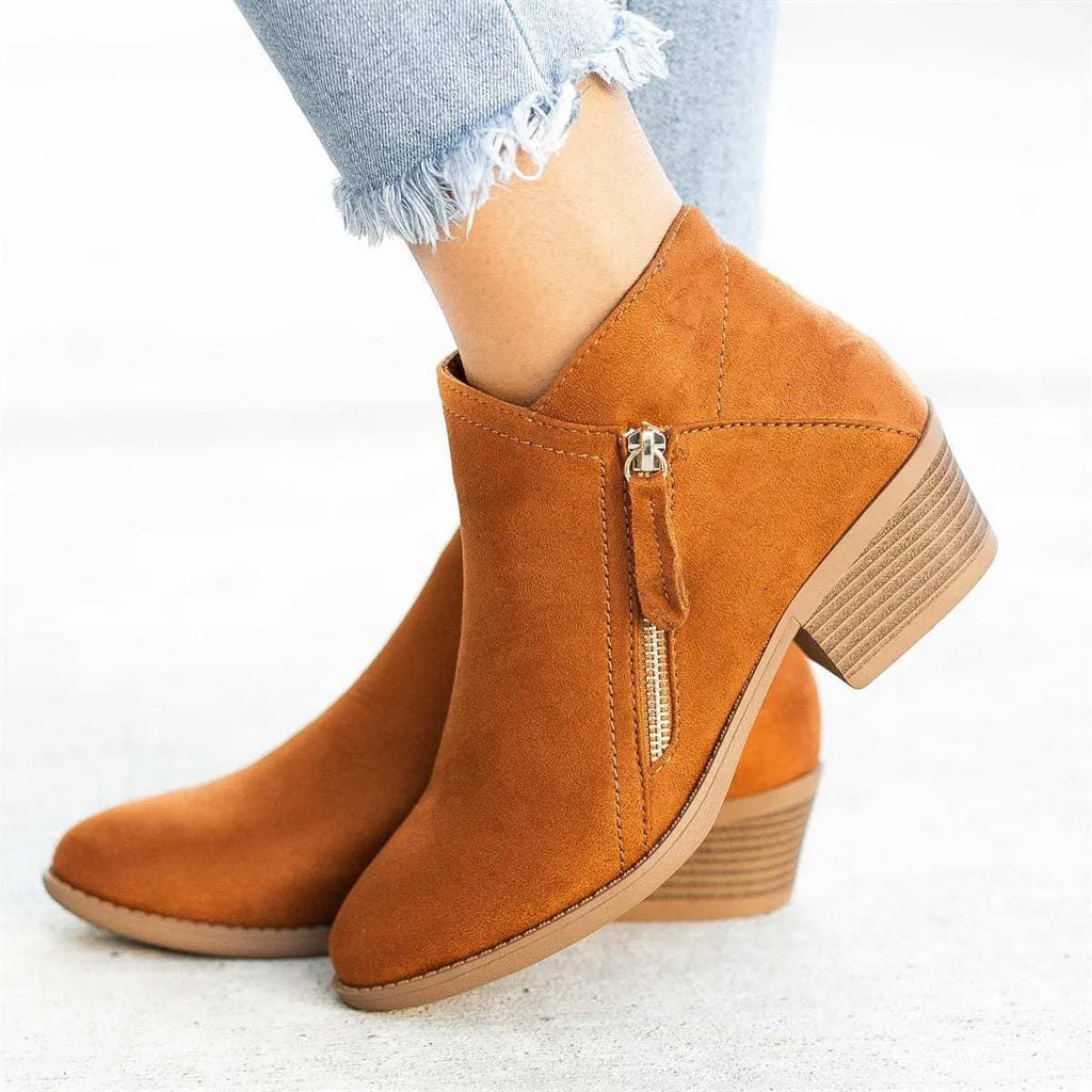 Women’s suede leather ankle boots with side zipper, thick heel, pointed toe, and non-slip sole in beige colour