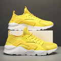 Men's low-top casual shoes in fluorescent colour with mesh upper and cross shoulder straps