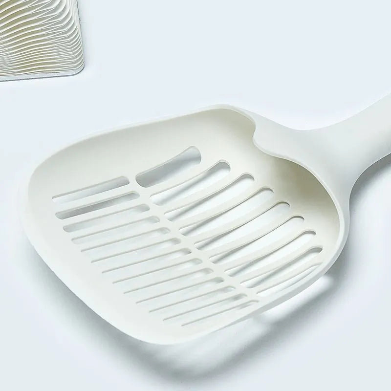 White plastic cat litter scoop with base tray measuring 29.5cm