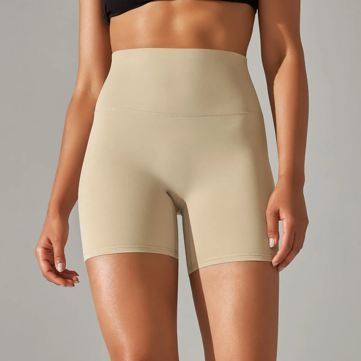 Women's high waist fitness tights in dark green colour with hip lift design for workout and daily wear