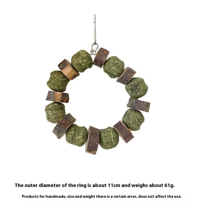 Hamster toy with applewood chew rod and woven straw ball ring for small pet enrichment